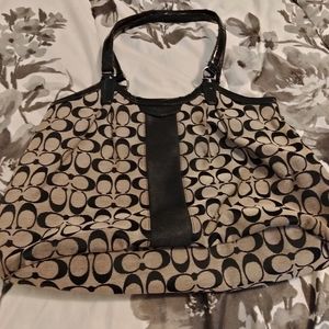 Black and white Coach handbag